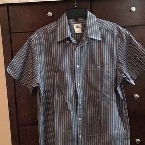 Lacoste short sleeves polo shirt in gray. Size 42.with front pocket